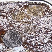 ME-149A ps Overview of fabric in Sil-Grt-St schist ME-149, field of view about 10mm. A main foliation defined by micas wraps around porphyroblasts of garnet and staurolite...