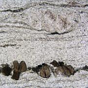 Practical 3: LH98-3 LH98-3, Moine Thrust zone, Eriboll. Plane-polarised light, width 0.8 mm. Fractured porphyroclasts of tourmaline (below) and feldspar (above) in dynamically...